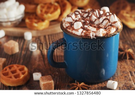 A mug with hot chocolate with marshmallow