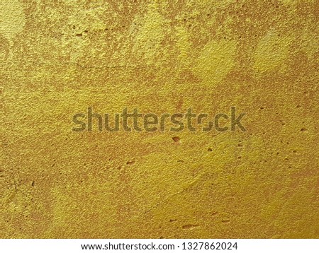 Gold-colored concrete background with pattern