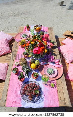 Festive table decor, beautiful event venue, creative beach wedding decor, 