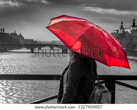 Siluette with red umbrella