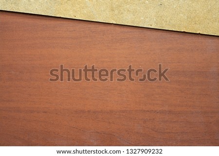 Geometric backgrounds of old and dusty cardboard and plywood with a fine texture