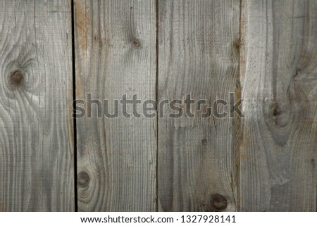 old and aged wooden textured background in brown.