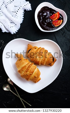 croissant for breakfast, croissant with chocolate cream