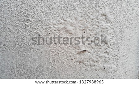 Color paint is peeling on concrete background texture.