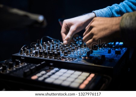 Pictures of a dj mixing his music