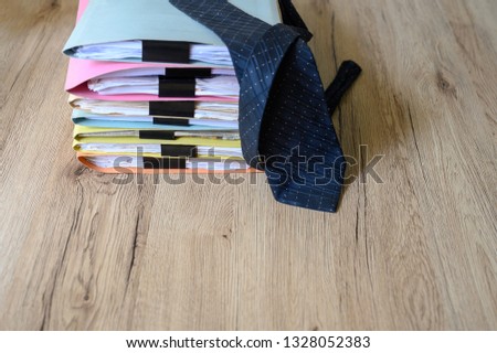 Documents in files placed on the office desk