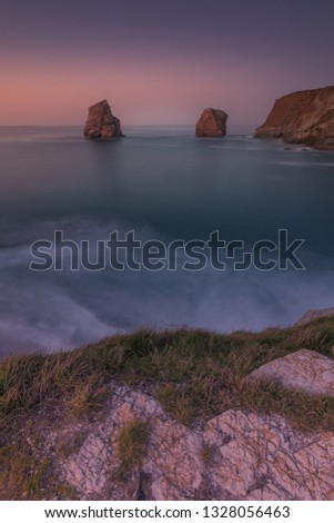The famous twin rocks at Hendaia's coast at the Basque Country.	