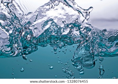 blue water wave with bubbles