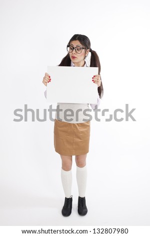 Young nerd woman holding white card