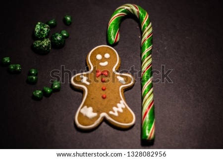gingerbread man and green lollipop