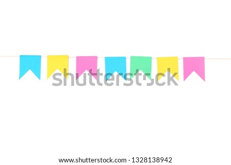 Colorful paper flags hanging on white background