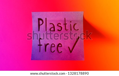 Plastic free check mark. Concept for ecology, recycling and green movement. Blue sticky note with inspirational phrase on gradient background. Handwritten reminder to save environment on Earth.