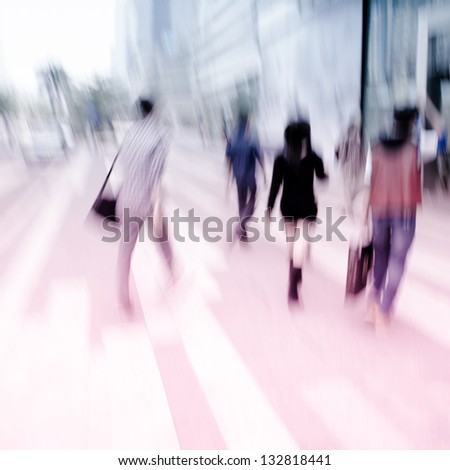 business people on urban city street blur
