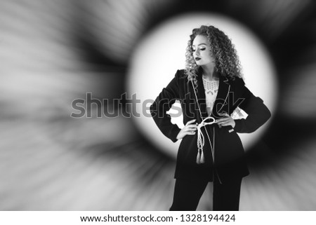 Business woman in classy suit in studio