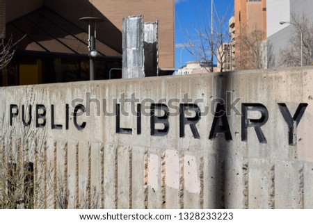Sign for the Albuquerque New Mexico main public library engraved concrete