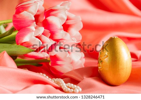 beautiful Easter card, background with flowers and Golden egg