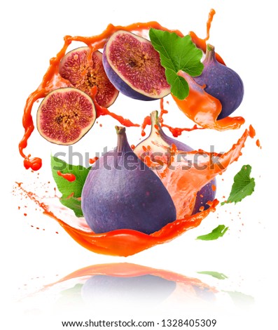 Flying in air fresh ripe whole and cut Figs with juice splash isolated on white background. High resolution image