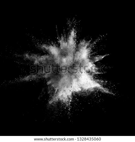 Explosion of white powder isolated on black background. Abstract colored background