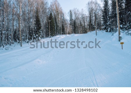 Slide for tubing. Ski Track. Tubing track. Mount for stumbling on buns. Winter slide.