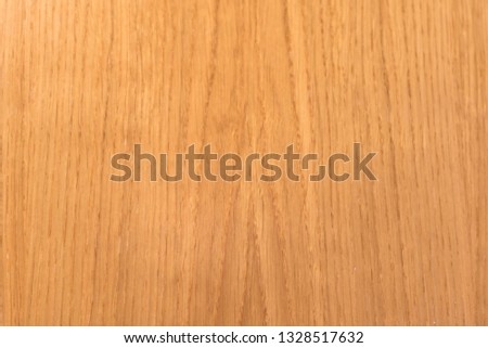 Brown horizontal oak wood table with vertical grain