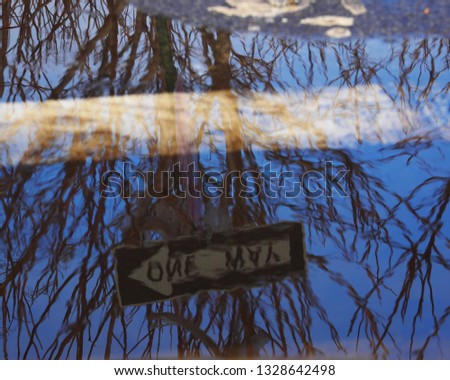 Reflections in the puddles in the Red Hook section of Brooklyn, NY, USA on March 3, 2019