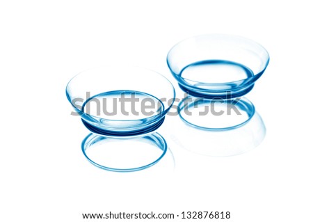 Contact lenses with reflections, isolated on a white background Royalty-Free Stock Photo #132876818