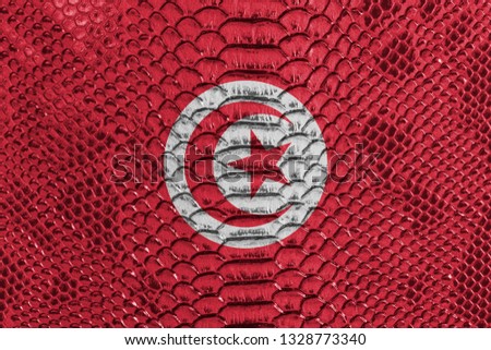 Tunisia flag on reptile skin
