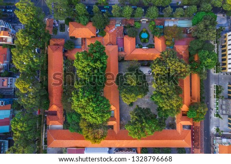 Top view aerial of Le Quy Don school, Ho Chi Minh City with development buildings, transportation, energy power infrastructure. Financial and business centers in developed Vietnam