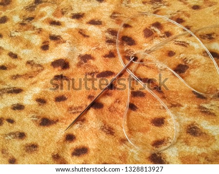 fabric with a wild animal skin pattern.leopard.