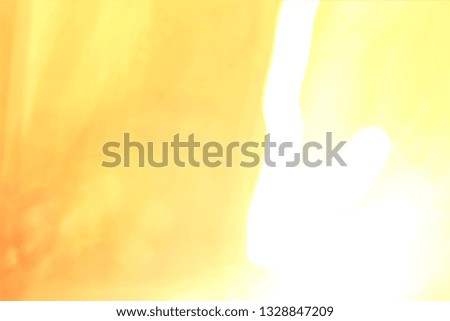 Yellow blurry background in warm colors