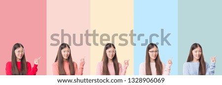 Collage of beautiful asian woman over colorful stripes isolated background with a big smile on face, pointing with hand and finger to the side looking at the camera.