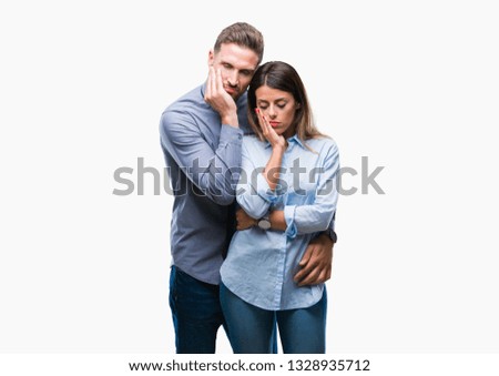 Young workers business couple over isolated background thinking looking tired and bored with depression problems with crossed arms.