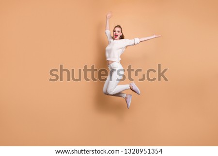 Full length body size view portrait of her she nice feminine attractive straight-haired cheerful cheery funny glamorous girl wearing white sweater raising hands up isolated on beige pastel background