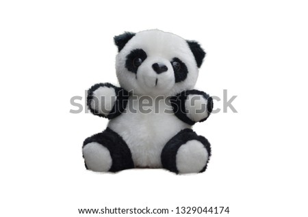 Doll black and white panda bear. Soft and cuddly stuffed toy.