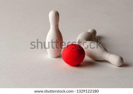 mini pins with a red ball