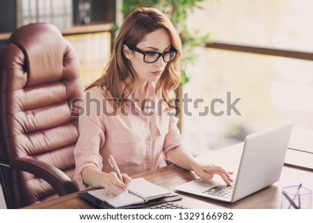 Close up photo beautiful she her business lady best boss got promotion working day night write down web lesson class study learn career development sit big office chair wearing specs formal wear