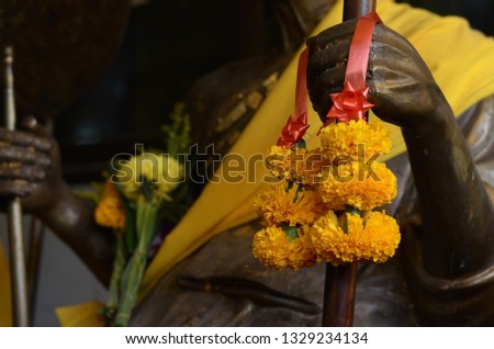 Marigold flower garland to worship the Buddha