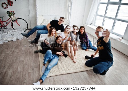Group of people making selfie. Team photographer, designers and models stuff on photosession, master class of proffesionals.