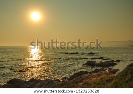 Coast, cliffs and Aegean sea, Izmir, sunset