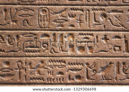 Hieroglypic carvings on wall close up