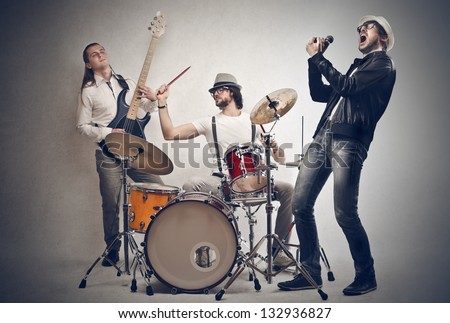band of musicians plays Royalty-Free Stock Photo #132936827