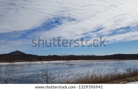 frozen pond with snow