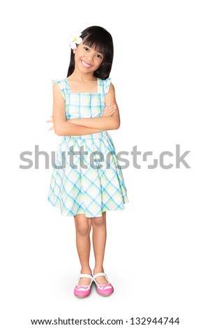 Asian little girl with white frangipani flower in her ear, Isolated over white