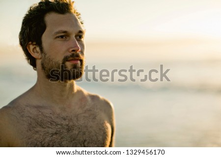 Man at beach.