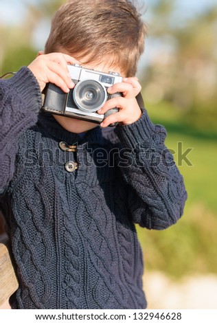 Little Boy Capturing Photo With Camera, Outdoors