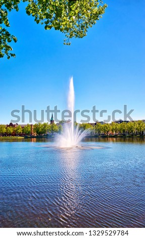 Fountain on the Pfaffenteich lake in Schwerin. Mecklenburg-Vorpommern, Germany
