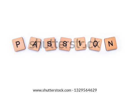 The word PASSION, spelt with wooden letter tiles over a white background.