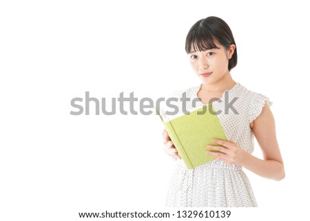 Young woman read a book