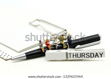 Miniature people : businessman and friend with Word Thank you on Thursday 27th,using for concept of Thank you Thursday.