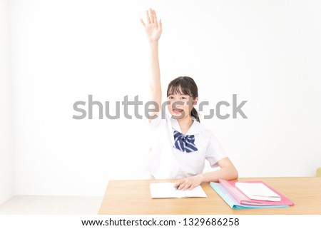 Student raising hand